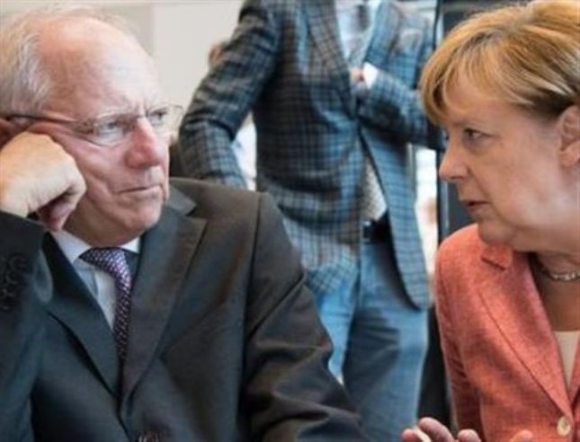 «Όχι» Σόιμπλε και Μέρκελ σε πάγωμα των ελληνικών επιτοκίων