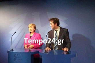 'Υψηλές" επαφές του Κώστα Καρπέτα με την... Άνγκελα Μέρκελ!